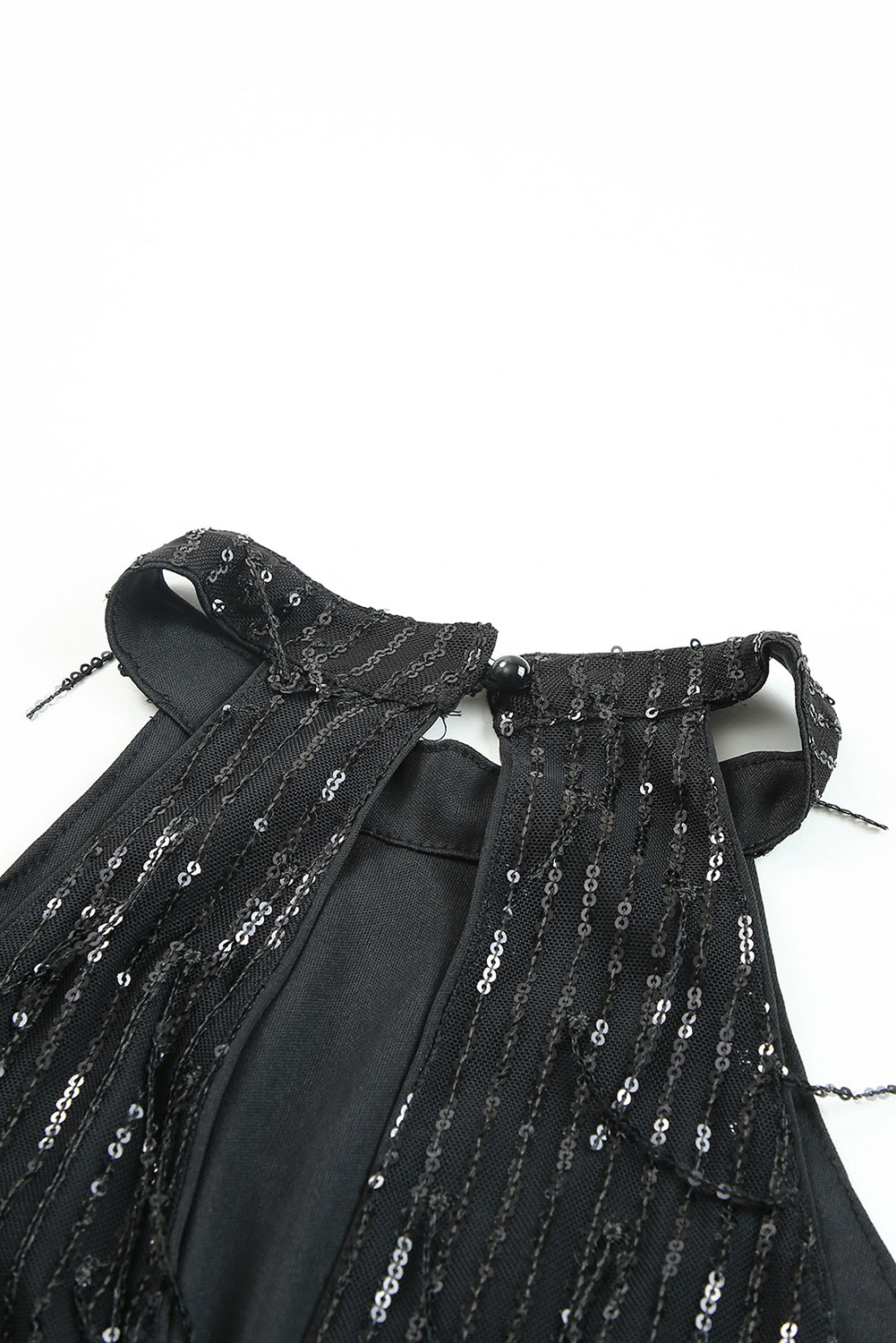 Mini vestido negro con flecos y lentejuelas